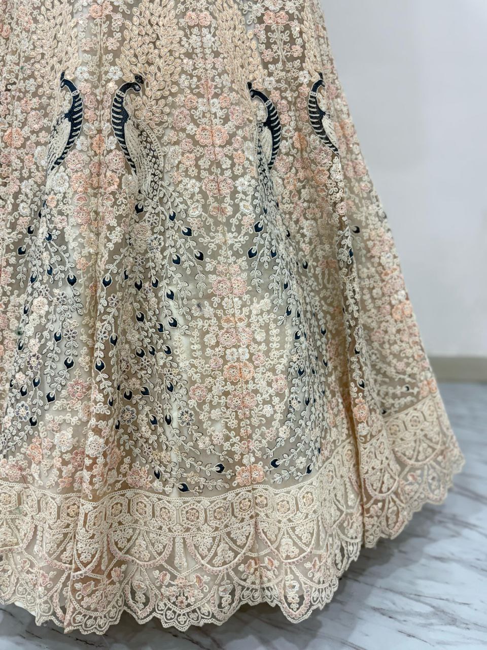 PREMIUM BUTTERFLY NET EMBELLISHED WITH SANDWICH SEQUENCE WORK WEDDING LEHENGA CHOLI