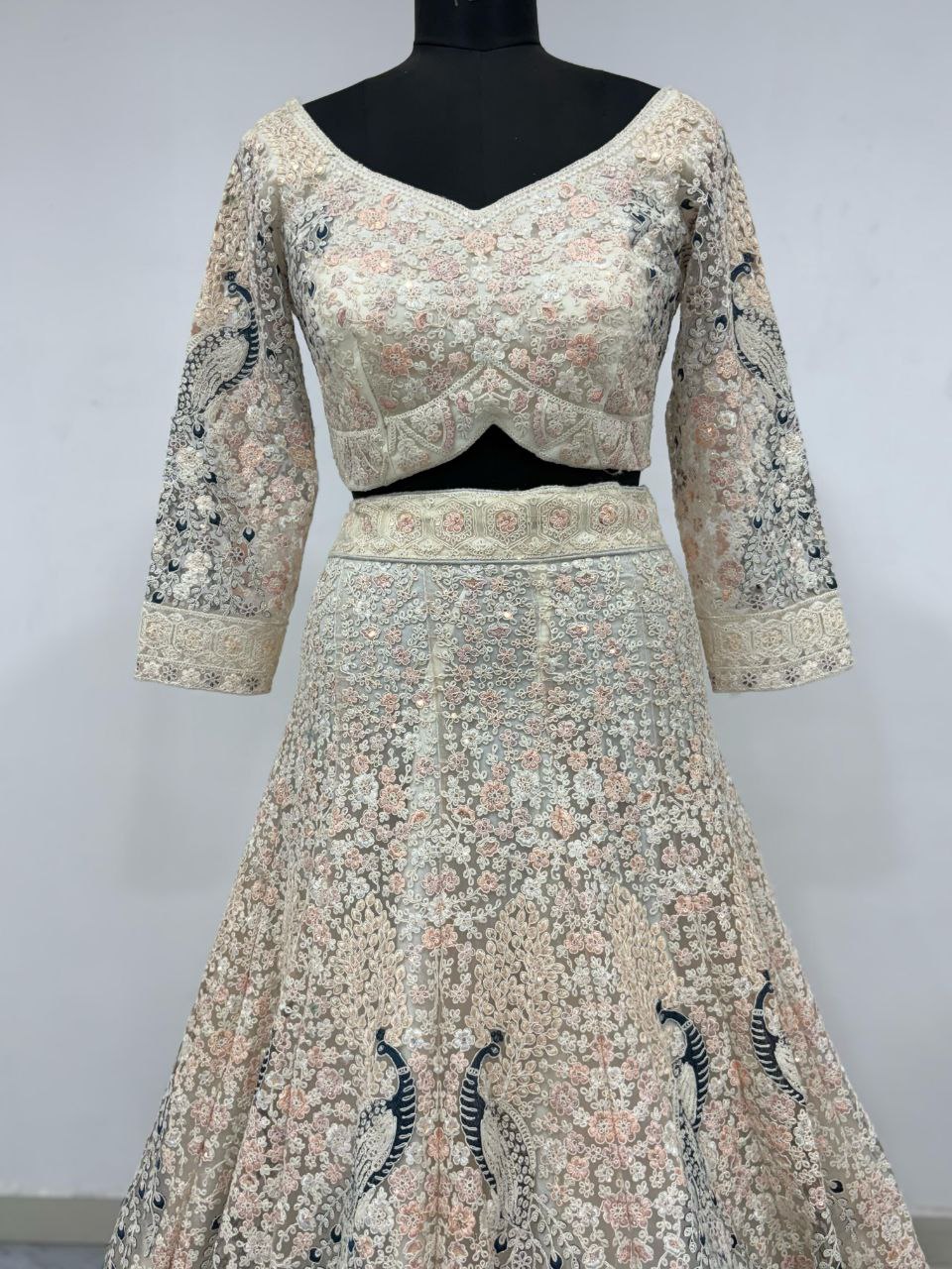 PREMIUM BUTTERFLY NET EMBELLISHED WITH SANDWICH SEQUENCE WORK WEDDING LEHENGA CHOLI