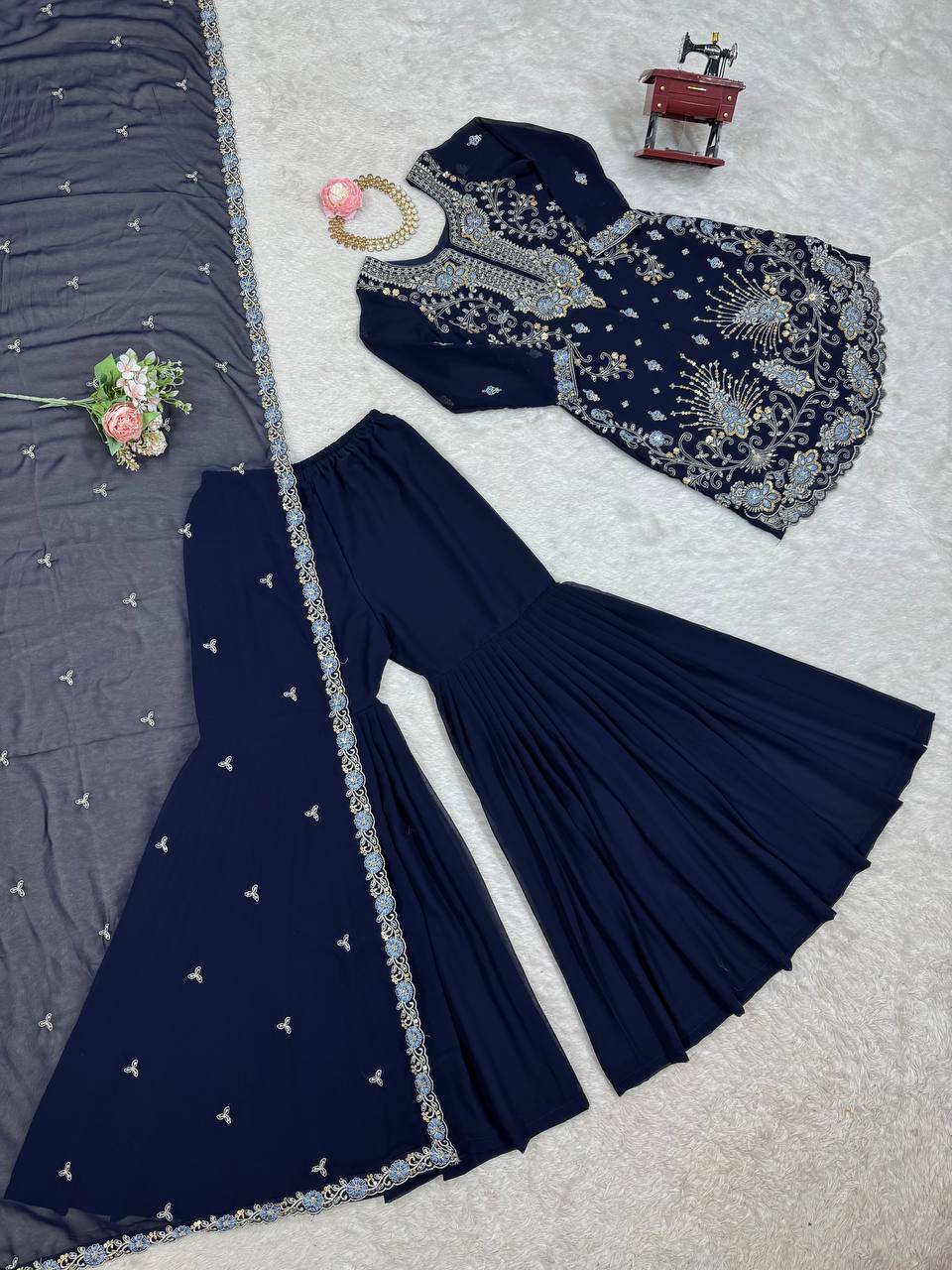 Blue Colour Georrgette Sequence With Thred Work Top With Sharara And Dupatta