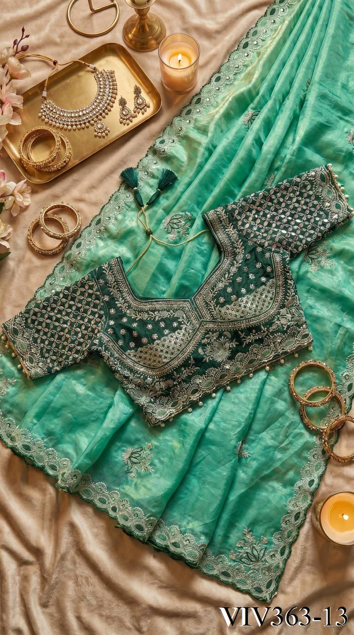 Beautiful Soft Fandy Satin Silk With Lotus Embroidery Work Saree