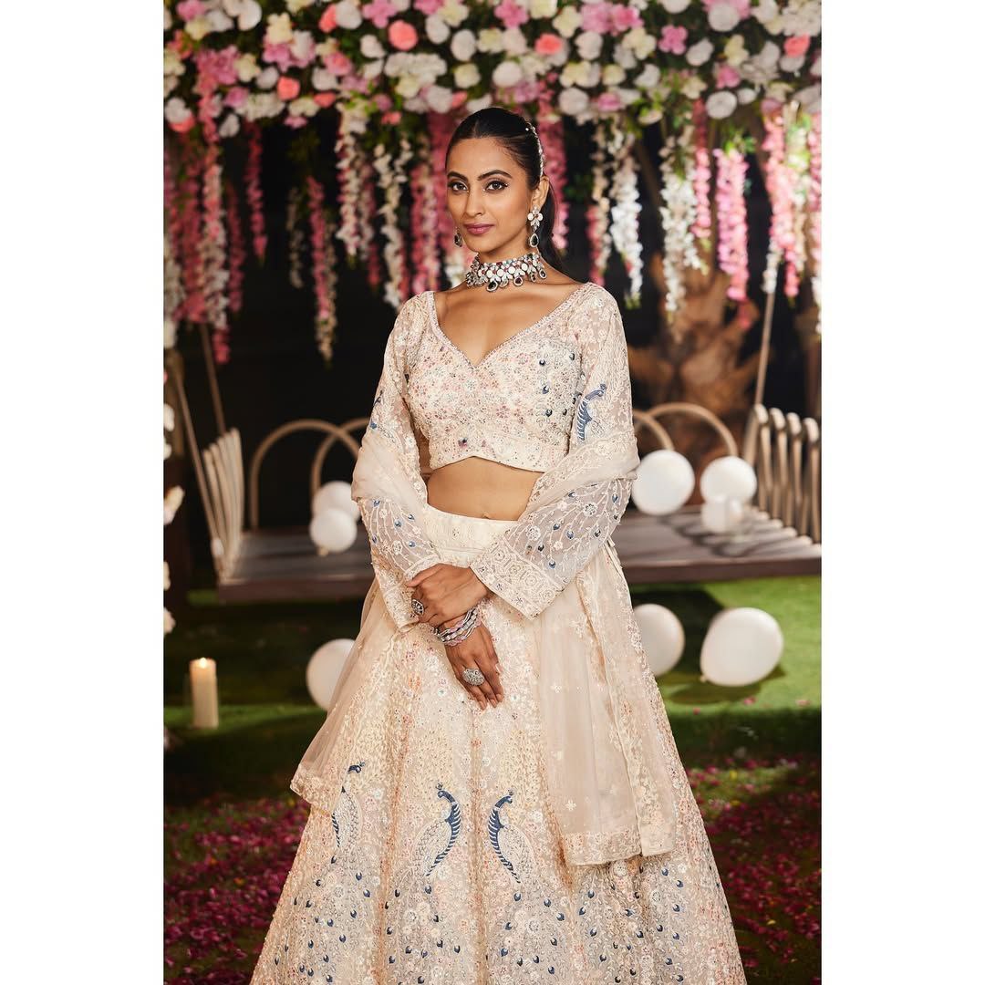 PREMIUM BUTTERFLY NET EMBELLISHED WITH SANDWICH SEQUENCE WORK WEDDING LEHENGA CHOLI