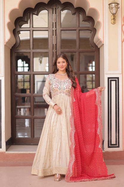 COSMOS WEAVING JAQUARD TRADITIONAL LOOK GOWN WITH BEAUTIFUL BANDHNI PRINT DUPATTA CREAMY COLOR
