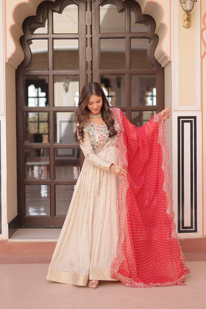 COSMOS WEAVING JAQUARD TRADITIONAL LOOK GOWN WITH BEAUTIFUL BANDHNI PRINT DUPATTA CREAMY COLOR