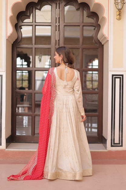 COSMOS WEAVING JAQUARD TRADITIONAL LOOK GOWN WITH BEAUTIFUL BANDHNI PRINT DUPATTA CREAMY COLOR